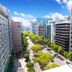 Stay Inn Taipei City view of tree-lined avenue between modern office buildings