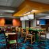 Fairfield Inn by Marriott Myrtle Beach Broadway at the Beach breakfast area with tables and chairs