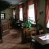 Erbgericht Gaststätte & Pension dining room in Brand-Erbisdorf with tables and large windows
