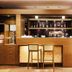 Hotel Villa Delle Rose - Malpensa bar area in Oleggio with stools and illuminated shelves