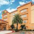 La Quinta Inn & Suites by Wyndham Houston Bush Intl Airpt E in Humble with palm tree and covered entrance