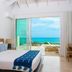 Sailrock South Caicos, Cockburn Harbour suite with king bed and ocean-view terrace