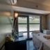 Golf Hôtel De Valescure & Spa Nuxe massage room with two treatment tables and garden view in Saint-Raphaël