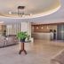 Mavrikos Hotel Tsilivi lobby with seating area, reception desk and modern ceiling lights