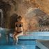 Grand Hotel Il Moresco, Ischia: indoor cave pool with woman seated on the edge