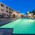 Fairfield Inn & Suites by Marriott Odessa outdoor pool illuminated at dusk