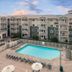 Worldmark Long Beach outdoor pool and hot tub with beachfront hotel building and balconies