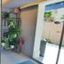 Vila Lili in Rovinj with a staircase, wood door, potted plants, and open entryway to outside