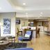 TownePlace Suites by Marriott Greensboro Coliseum Area lounge with seating and kitchenette in Greensboro