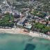 Aerial view of Hotel Mistral in Campo nell'Elba beside a sandy beach and turquoise water