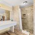 Travelodge by Wyndham San Clemente Beach bathroom with vanity, mirror and tiled walk-in shower