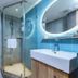 Home Inn Neo Shenzhen Dongmen Pedestrian Street Shaibu Metro Station bathroom with shower, sink and toilet in Shenzhen