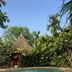 Amphawa Club Resort & Spa in Amphawa with tropical pool and thatched-roof pavilion