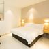 Extreme Boutique Hotel Kluang guest room with double bed, desk, chair, and inset room preview