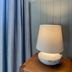 Doonmore Hotel Inishbofin room lamp beside blue curtains and paneled wall