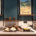 Logis Hôtel de Port d'Alon buffet counter with breakfast foods, toaster, coffee machine and framed wall art