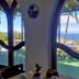 Hotel Parco Conte in Casamicciola Terme with sea view through arched windows and terrace