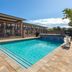 Kokopelli Inn Sedona, Trademark Collection by Wyndham poolside exterior with outdoor pool and lounge chairs