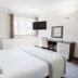 The Appleby Inn Hotel in Swadlincote guest room with double bed, desk, wall TV and window