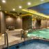 Marigold Thermal & Spa Hotel Bursa in Bursa indoor spa pool with waterfall wall and lounge chairs