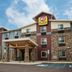 My Place Hotel-Jamestown, ND exterior with stone facade and covered entrance in Jamestown