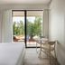 Una Hotels Forte Dei Marmi room with balcony view of trees and outdoor seating, Forte dei Marmi