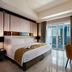 The Residences at The Ritz-Carlton Jakarta, Pacific Place room with city-view balcony and desk