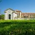 Beijing Jinyu Badaling Resort in Beijing with manicured hedges and a Mediterranean-style hotel facade