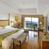 Forum For Asia Gold Coast Hotel Qionghai guest room with balcony and sea view