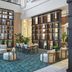 JW Marriott Gold Coast Resort & Spa lobby lounge in Surfers Paradise with seating, shelves and plants