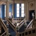 The Wellem in Düsseldorf lobby with grand blue-carpeted staircases and tall windows