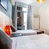 Ch Las Murallas Madrid twin room with two beds and balcony door