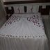 Resort L'acqua Diroma V in Caldas Novas, bed decorated with rose petals and towel swans