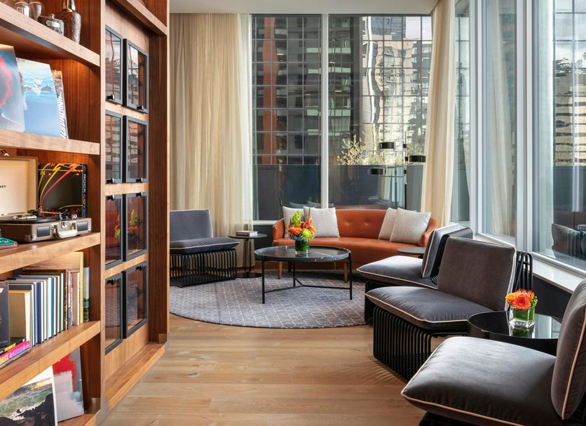 The Sound Hotel Seattle Belltown Tapestry Collection by Hilton lounge with city views and seating area in Seattle