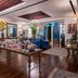Sofitel Dubai Downtown in Dubai, elegant hotel lounge with buffet table and blue seating
