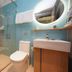 Home Inn Neo Beijing Chaoyang North Road Shilibao Metro Station bathroom with shower, toilet and sink in Beijing