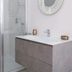 B&B I 10 Mondi Milan bathroom with walk-in shower, floating vanity and round mirror