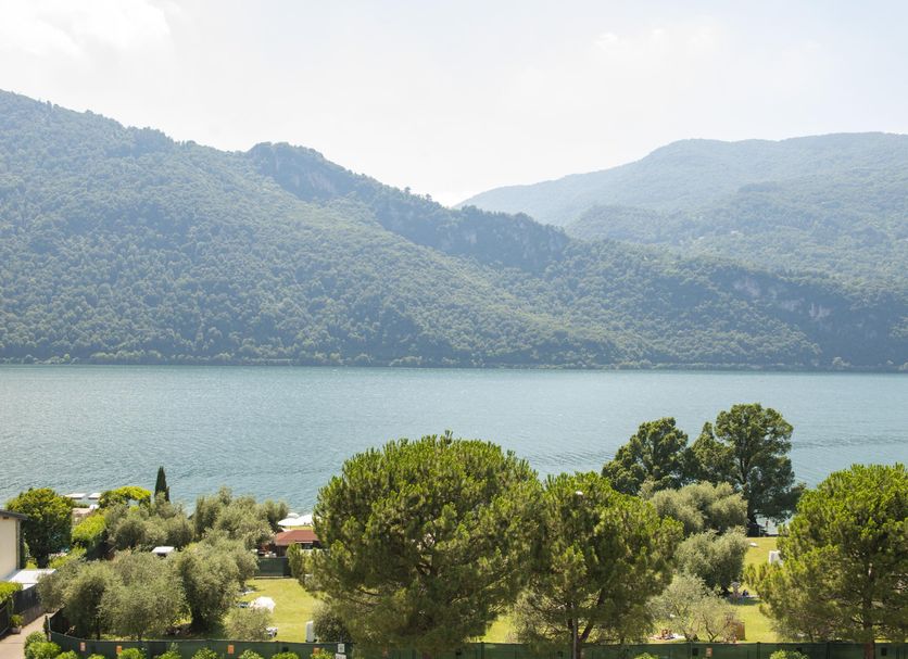 Park Hotel Abbadia in Abbadia Lariana with lake and mountain views from a lush garden