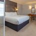 Best Western Aberavon Beach Hotel Port Talbot room with king bed, desk and seating area