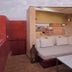 Ptit Habibi in Marrakech rooftop terrace with daybed, low table, lanterns and sunset sky