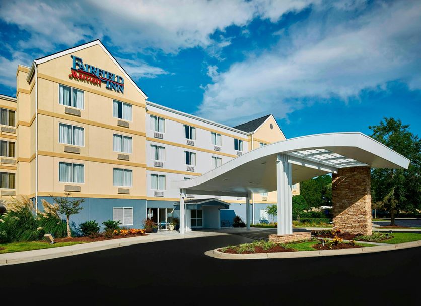 Fairfield Inn by Marriott Myrtle Beach Broadway at the Beach exterior with covered entrance and blue sky