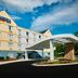 Fairfield Inn by Marriott Myrtle Beach Broadway at the Beach exterior with covered entrance and blue sky