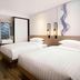Fairfield by Marriott Busan guest room with two twin beds and modern bathroom area in Busan