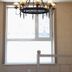 Center Of City Creo Hotel Yanbian chandelier light above a window in a hotel room