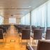 Hilton Garden Inn Venice Mestre San Giuliano meeting room with rows of chairs and projection screen