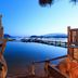 Grand Hôtel De Cala Rossa in Porto-Vecchio, waterfront infinity pool with bay and mountain views