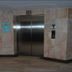 Suriwongse Hotel, Bangkok elevator with marble walls and stainless steel doors