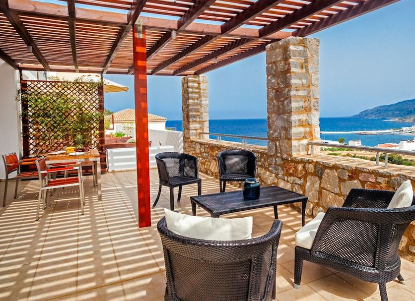 Kythea Resort in Agia Pelagia terrace with outdoor seating and sea view