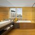 Aloft Bengaluru Outer Ring Road bathroom with soaking tub, walk-in shower and city view