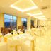 Oak Ray Heritage Hotel in Kandy banquet hall with round dining tables and mountain-view windows